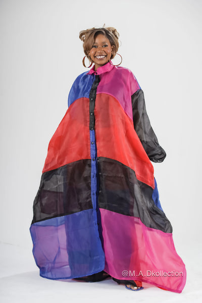 A multi-color oganza fabric shirt dress with a fitted design and side pockets. fashion inspired fashion
african clothing for women